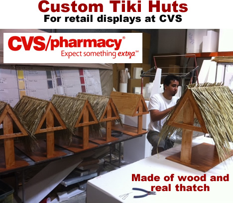 wood and thatch tiki hut retail displays